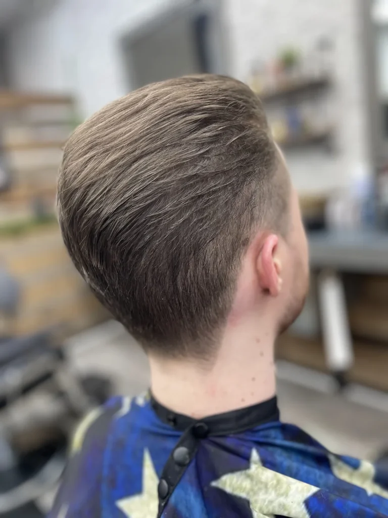 Back of a scissor-cut head with a clean taper down the neck